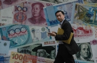 Китай ограничил своих граждан в долларах - «Финансы»